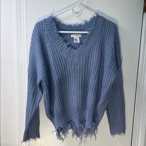 Light Blue V-Neck Sweater with Frayed Hem